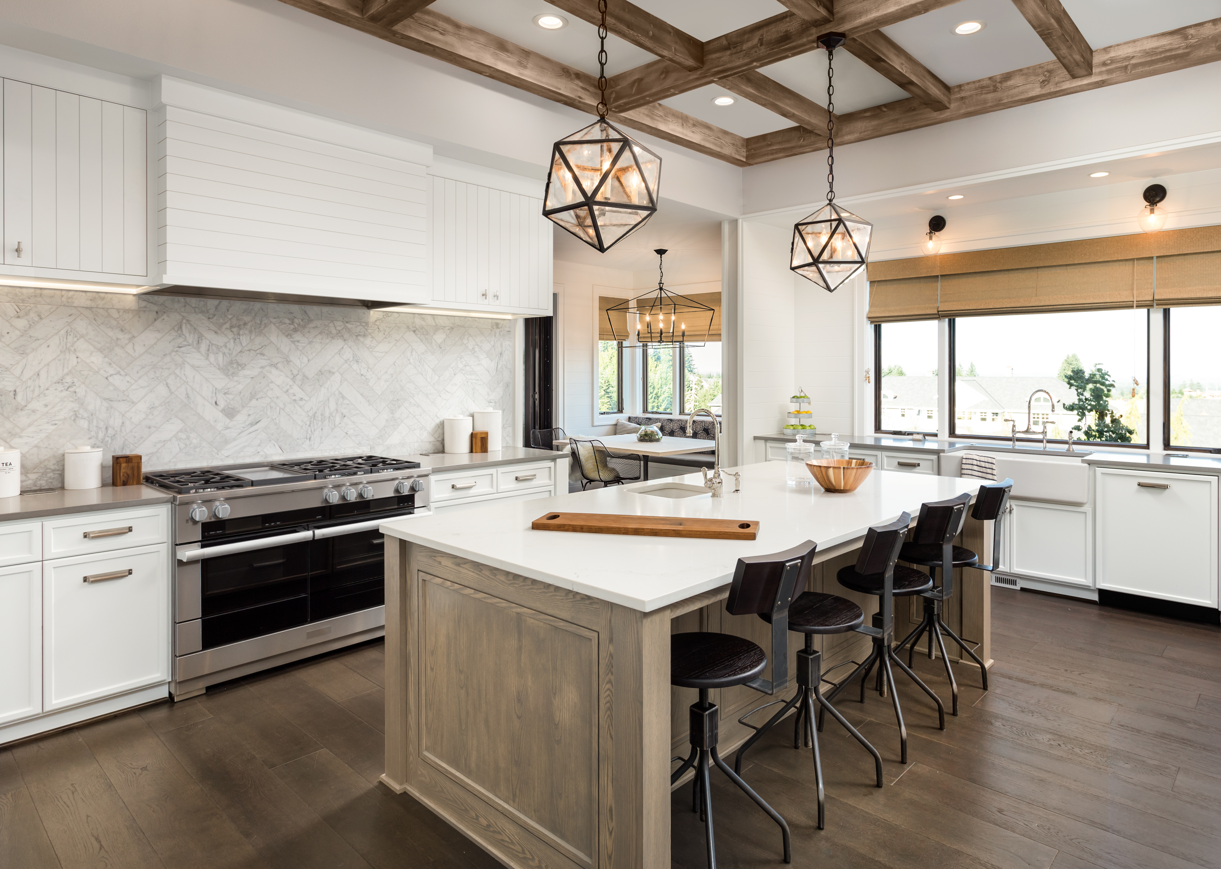 kitchen remodel with white cabinets and kitchen island