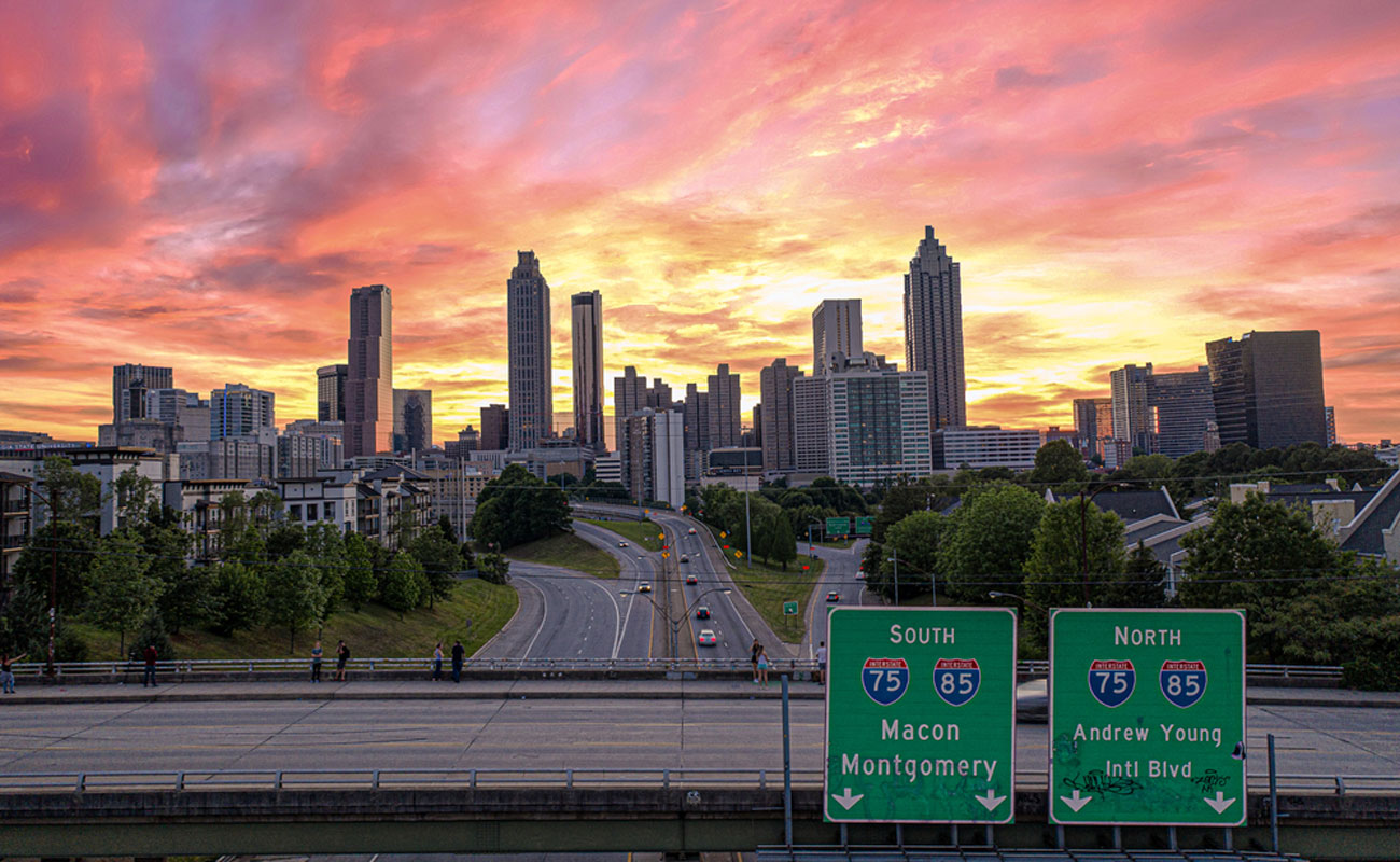 Beautiful sunset view of Atlanta skyline as seen from the Jackson Street bridge near Freedom Parkway
