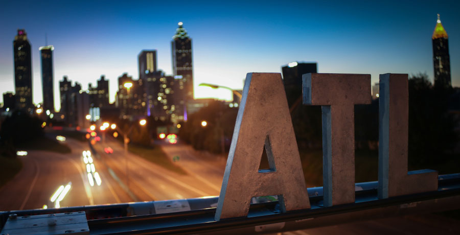 The letters ATL seen on a bridge over the Downtown Connector in Atlanta