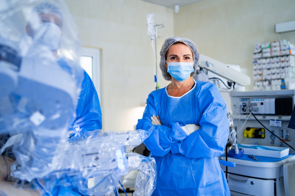 Female surgery technician in a modern operating room with advanced equipment. Opportunity for advancementment