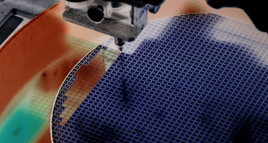 A machine applies UV coating to a silicon wafer