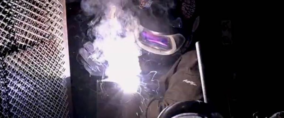 Students learn welding skills.