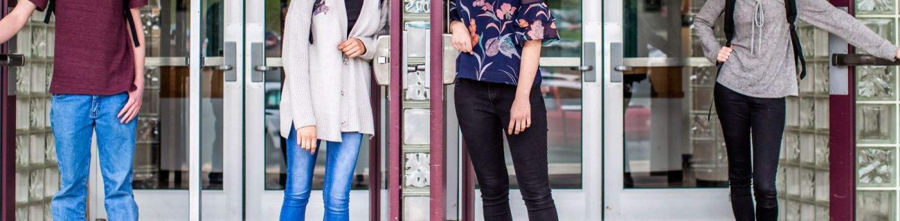 students outside building at Piedmont Virginia Community College campus in Charlottesville, Virginia