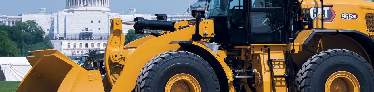 A Cat bulldozer in front of the US Capitol