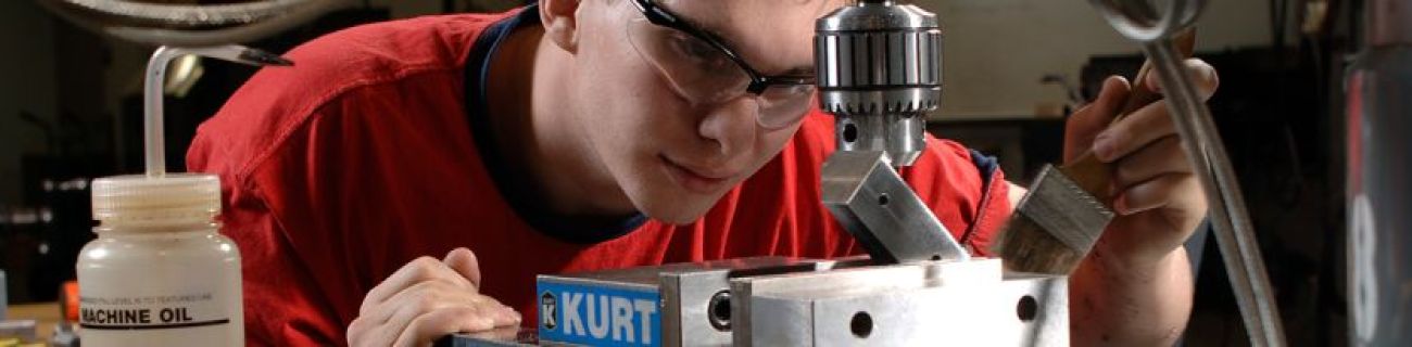 Student working on an engine at Metropolitan Community College (MO)