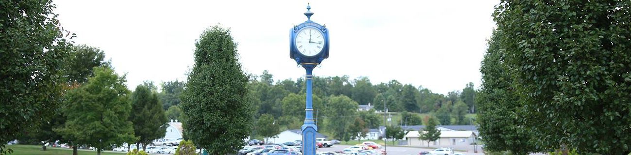 A photo of the blue clocktower on the West Virginia University at Parkersburg campus.