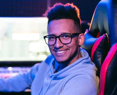 AV technician at a computer screen