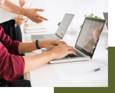 Person typing on laptop computer