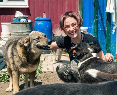 Vet technician with two dogs