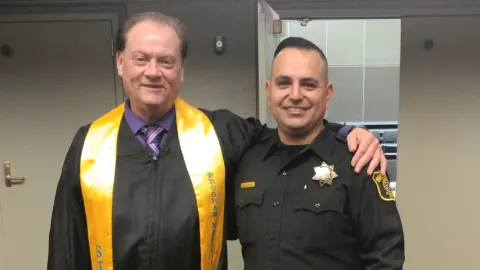 Donald Martin, Criminal Justice program director at San Joaquin Valley College, with former student