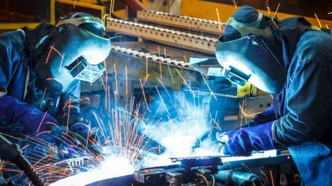 Two welders learn how to weld. Importance of finding the best trade school program for you