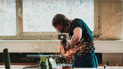 man in safety glasses welding; learn how SkillPointe works