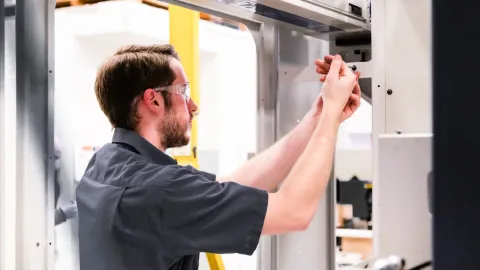 Jack Jaeger works on a machine for Helios Gear Products