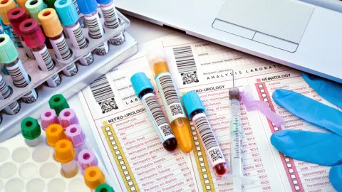 lab technicians perform tests, including bloodwork