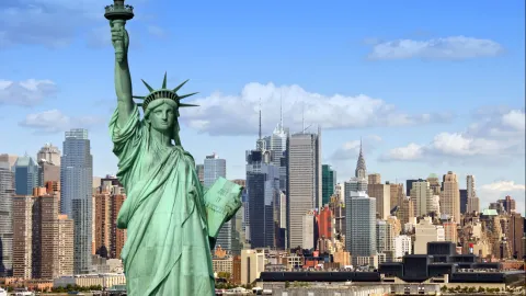Statue of Liberty with Manhattan in the background, New York City skyline