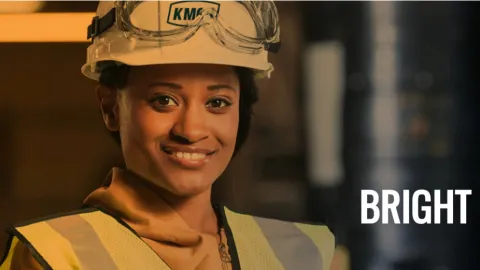 Young black woman in hardhat and safety glasses represented a person who benefitted from the SkillPointe Foundation scholarship