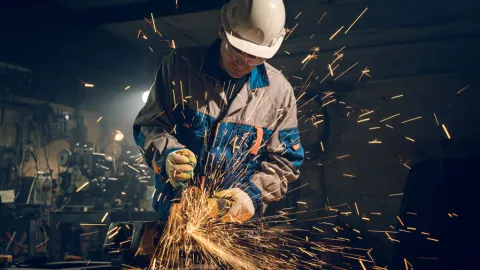 A welder on the job with sparks flying