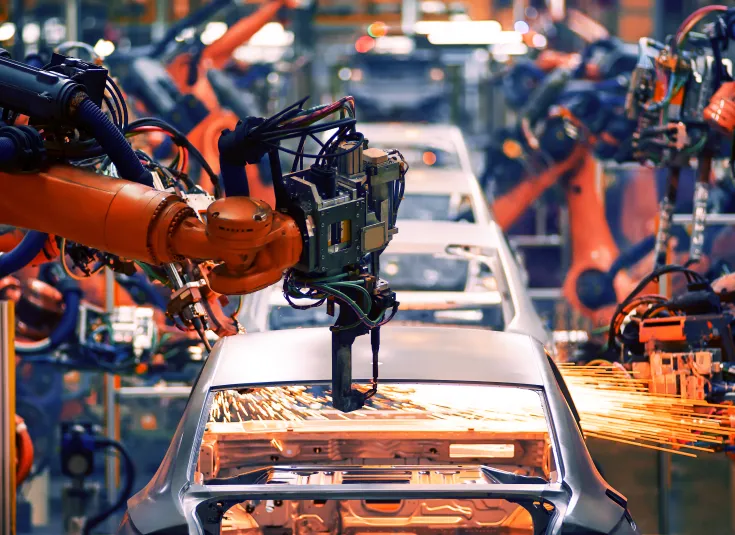 Electromechanical technicians maintain equipment like the robotic arm in a car factory