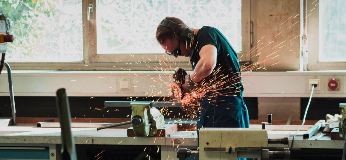 Man welding in a workshop