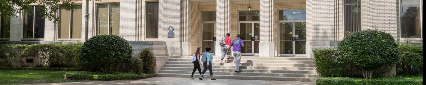 Four students entering campus building on Kilgore College in Kilgore TX