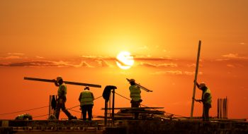 Sunset on a construction site, what the infrastructure bill 2021 could mean for trade jobs