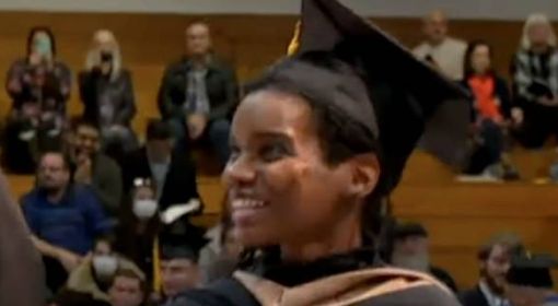 A Santa Fe College student receives her degree at a graduation ceremony