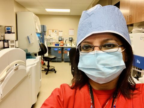 Kavita Cain, a lab tech in Ohio, says that much of her time nowadays is spent performing COVID, flu and other respiratory tests.