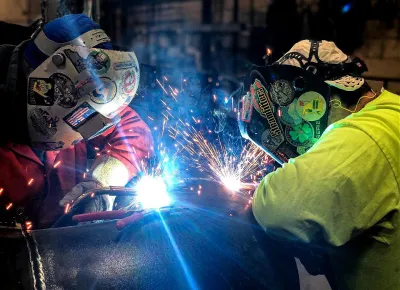 Todd Clements, steamfitter, works on a piping system
