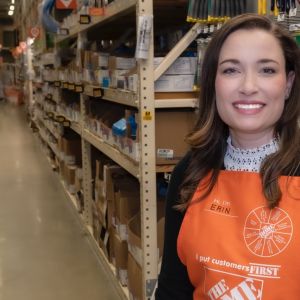 Erin Izen in Home Depot store with apron