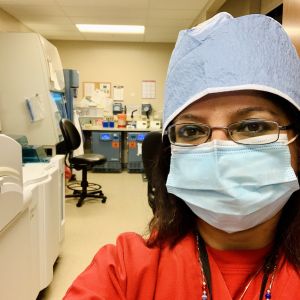 Kavita Cain, a lab tech in Ohio, says that much of her time nowadays is spent performing COVID, flu and other respiratory tests.