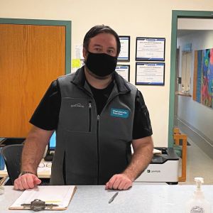 Pharmacy technician Chris Hicks in the Charlottesville Free Clinic pharmacy